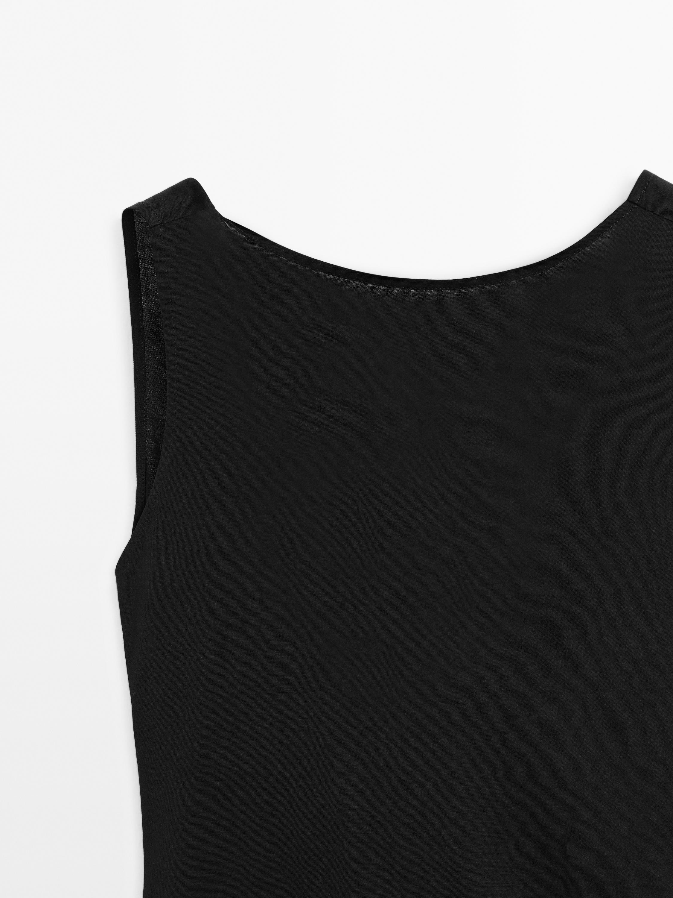 100% cotton top with draped low-cut back